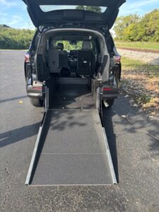 Black Toyota Sienna with Driverge Rear Entry Manual Fold Out conversion