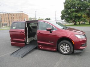 Red Chrysler Voyager with BraunAbility Side Entry Automatic Fold Out conversion