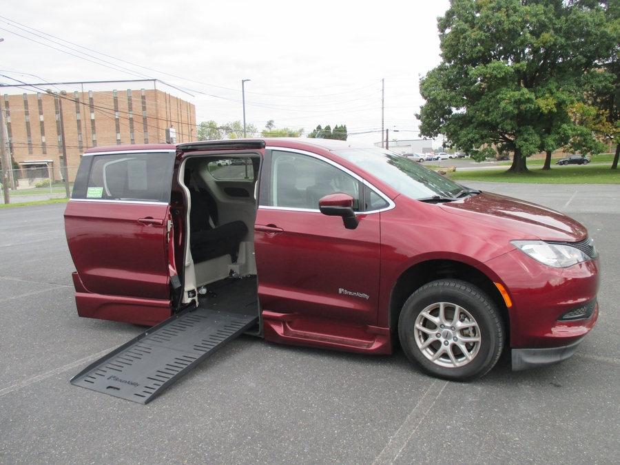 Red Chrysler Voyager with BraunAbility Side Entry Automatic Fold Out conversion
