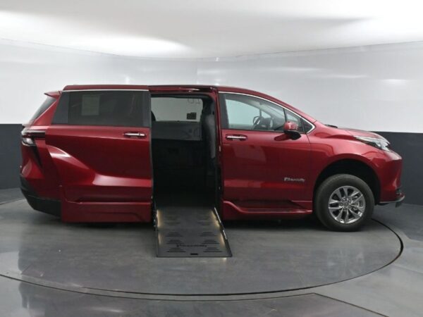 Red Toyota Sienna with BraunAbility Side Entry Automatic Fold Out conversion