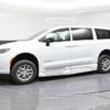 White Chrysler Pacifica with BraunAbility Side Entry Automatic Fold Out conversion