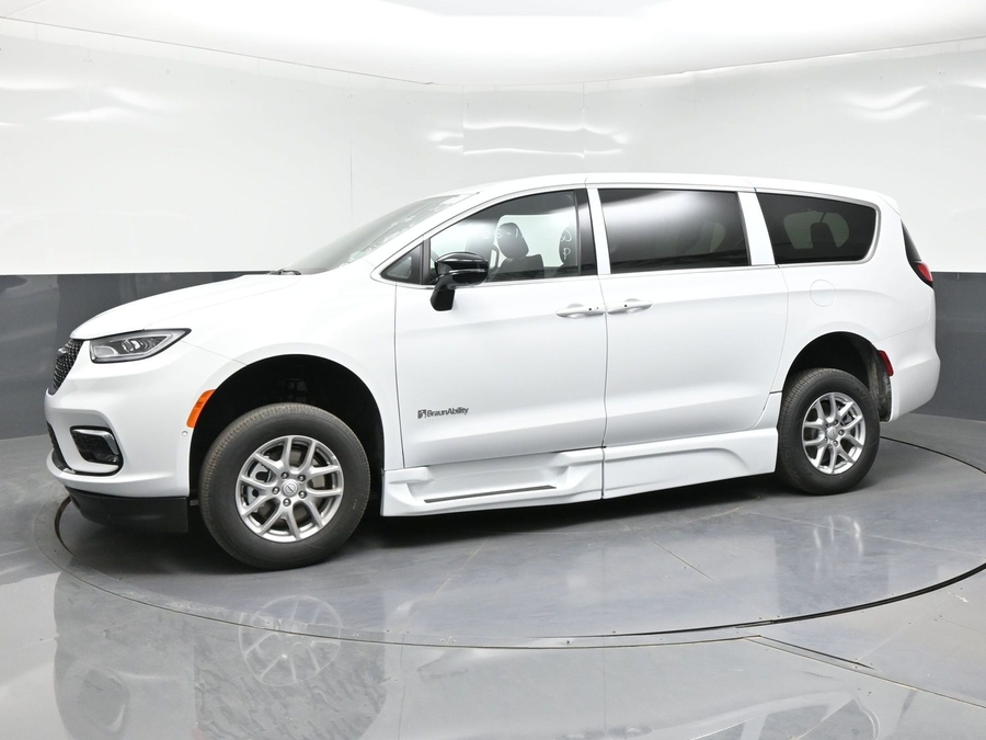 White Chrysler Pacifica with BraunAbility Side Entry Automatic Fold Out conversion