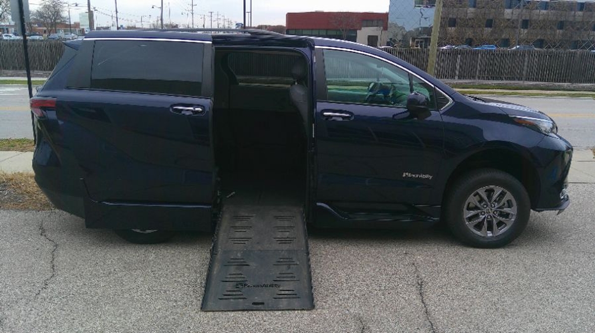 Blue Toyota Sienna with BraunAbility Side Entry Automatic Fold Out conversion