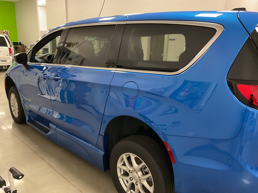 Blue Chrysler Pacifica with BraunAbility Side Entry Automatic Fold Out conversion