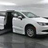 White Chrysler Voyager with BraunAbility Side Entry Automatic Fold Out conversion