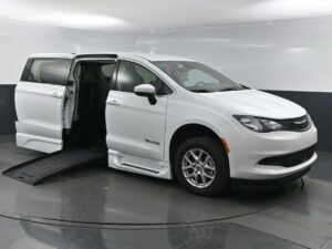 White Chrysler Voyager with BraunAbility Side Entry Automatic Fold Out conversion