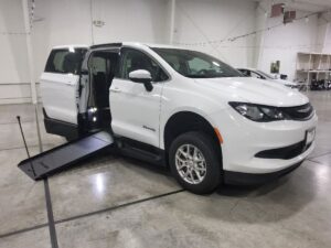 White Chrysler Voyager with BraunAbility Side Entry Manual In Floor conversion
