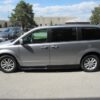 Silver Dodge Grand Caravan with Driverge Side Entry Automatic Fold Out conversion