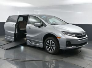 Silver Honda Odyssey with BraunAbility Side Entry Automatic In Floor conversion