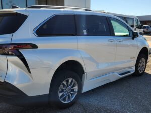 White Toyota Sienna with BraunAbility Side Entry Automatic Fold Out conversion