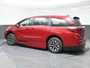Red Honda Odyssey with BraunAbility Side Entry Automatic In Floor conversion