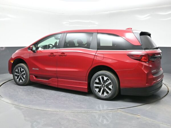 Red Honda Odyssey with BraunAbility Side Entry Automatic In Floor conversion