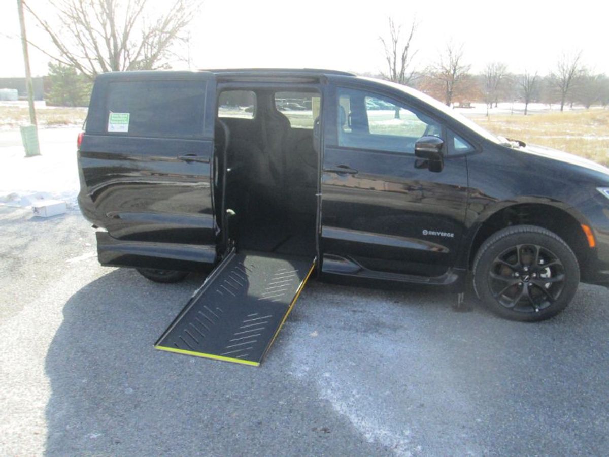 Black Chrysler Pacifica with Driverge Side Entry Automatic Fold Out conversion