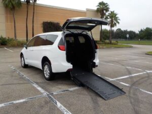 White Chrysler Voyager with BraunAbility Rear Entry Manual Fold Out conversion