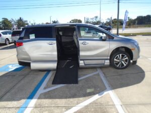 Silver Honda Odyssey with Vantage Mobility Side Entry Automatic In Floor conversion
