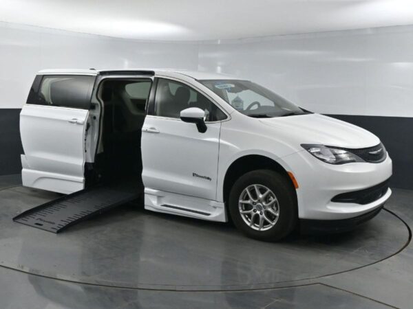 White Chrysler Voyager with BraunAbility Side Entry Automatic Fold Out conversion