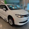 White Chrysler Voyager with BraunAbility Side Entry Automatic Fold Out conversion