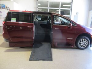 Red Chrysler Pacifica with BraunAbility Side Entry Automatic In Floor conversion