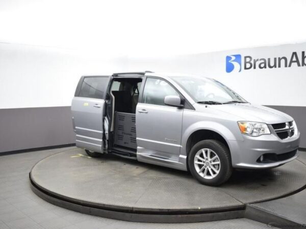 Silver Dodge Grand Caravan with BraunAbility Side Entry Automatic Fold Out conversion