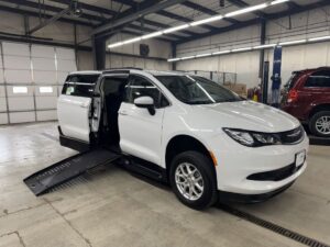 White Chrysler Voyager with BraunAbility Side Entry Manual Fold Out conversion