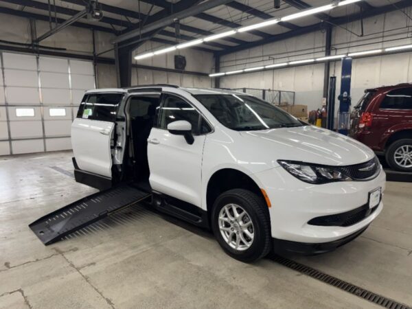 White Chrysler Voyager with BraunAbility Side Entry Manual Fold Out conversion