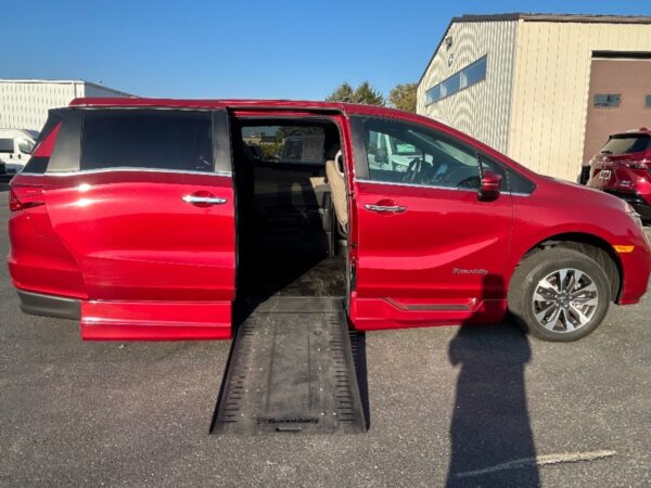 Red Honda Odyssey with BraunAbility Side Entry Automatic In Floor conversion