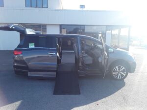 Grey Honda Odyssey with BraunAbility Side Entry Automatic In Floor conversion