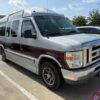 Silver Ford Econoline with Other Side Entry Automatic Fold Out conversion