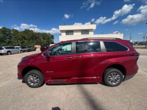Red Toyota Sienna with BraunAbility Side Entry Automatic In Floor conversion