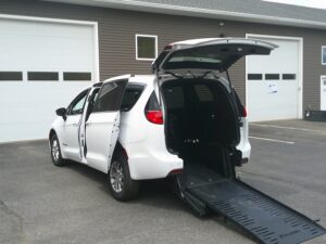 White Chrysler Voyager with BraunAbility Rear Entry Manual Fold Out conversion