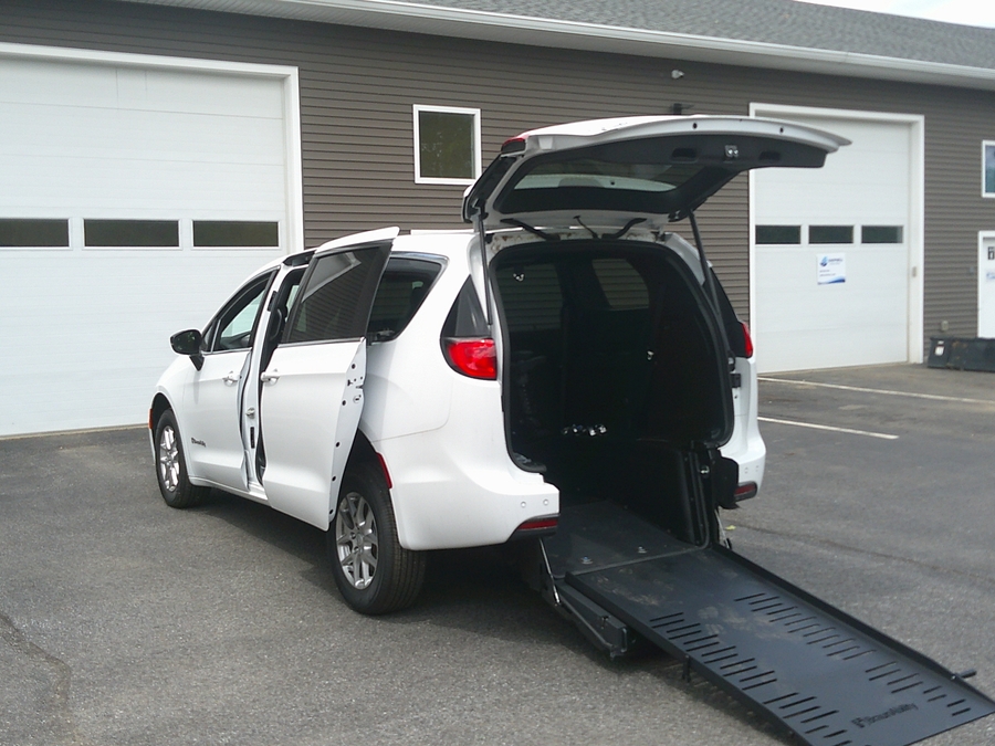 White Chrysler Voyager with BraunAbility Rear Entry Manual Fold Out conversion