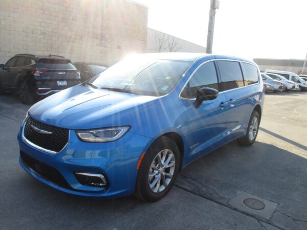 Blue Chrysler Pacifica with Driverge Side Entry Automatic Fold Out conversion