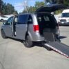 Silver Dodge Grand Caravan with Driverge Rear Entry Manual Fold Out conversion