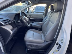 White Toyota Sienna with BraunAbility Side Entry Automatic Fold Out conversion