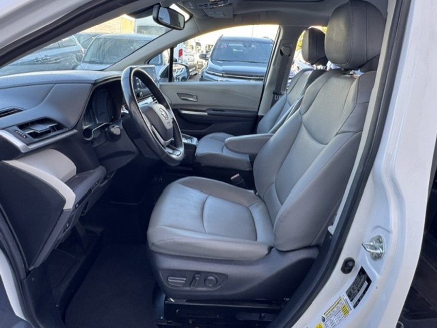 White Toyota Sienna with BraunAbility Side Entry Automatic Fold Out conversion