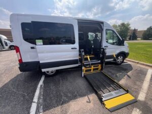 White Ford Transit with Other Side Entry Automatic Fold Out conversion