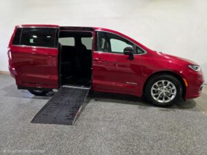 Red Chrysler Pacifica with Driverge Side Entry Automatic Fold Out conversion