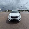 White Chrysler Pacifica with BraunAbility Side Entry Automatic Fold Out conversion