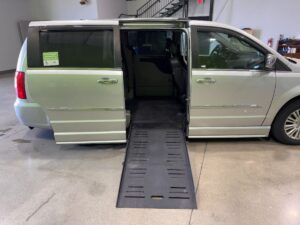 Black Chrysler Town and Country with BraunAbility Side Entry Automatic Fold Out conversion