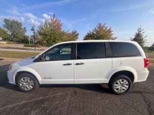 White Dodge Grand Caravan with BraunAbility Rear Entry Manual Fold Out conversion
