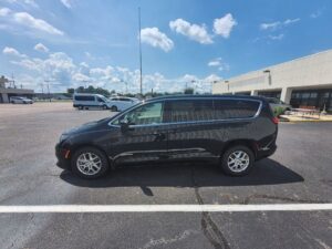 Black Chrysler Voyager with Driverge Rear Entry Manual Fold Out conversion