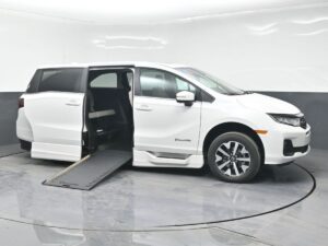 White Honda Odyssey with BraunAbility Side Entry Automatic In Floor conversion