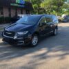 Black Chrysler Pacifica with Driverge Side Entry Automatic Fold Out conversion