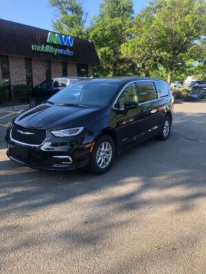 Black Chrysler Pacifica with Driverge Side Entry Automatic Fold Out conversion