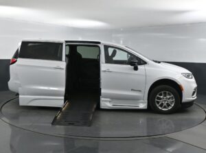 White Chrysler Pacifica with BraunAbility Side Entry Automatic Fold Out conversion
