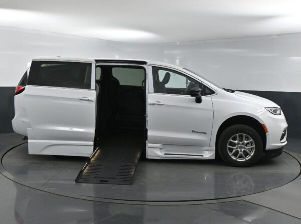 White Chrysler Pacifica with BraunAbility Side Entry Automatic Fold Out conversion