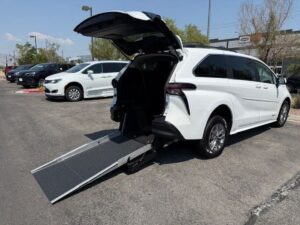 White Toyota Sienna with Driverge Rear Entry Manual Fold Out conversion