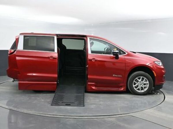 Red Chrysler Pacifica with BraunAbility Side Entry Automatic In Floor conversion