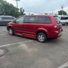 Red Dodge Grand Caravan with BraunAbility Side Entry Automatic Fold Out conversion