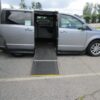 Silver Dodge Grand Caravan with Driverge Side Entry Automatic Fold Out conversion
